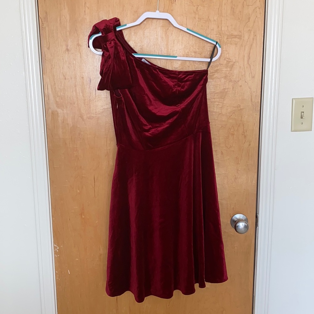 One-shoulder, burgundy velvet dress